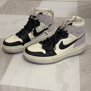 Nike Women's Jordans Black, White, and Purple Sneakers